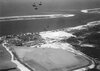 A 5-5-34 aerial view looking south at the 'Gymkhana Hop' stunt team of VN-508's F2B-1s perform...jpg